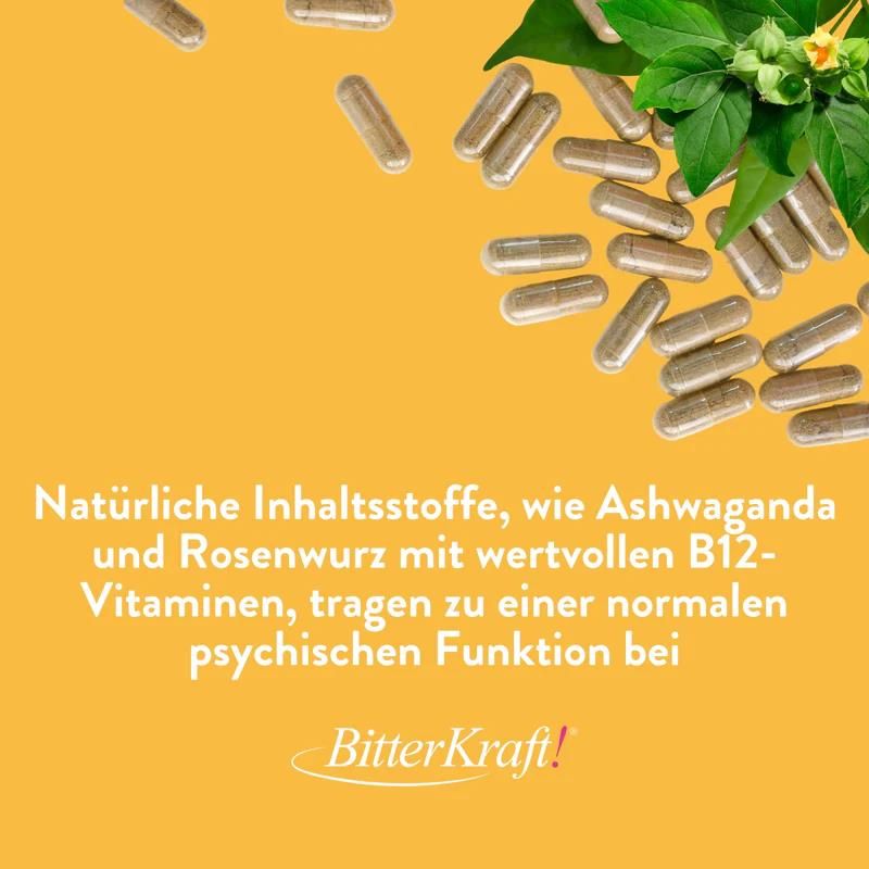 Kapseln verstreut. Text beschreibt Inhaltsstoffe. Blätter im Hintergrund. "BitterKraft!" Logo unten.