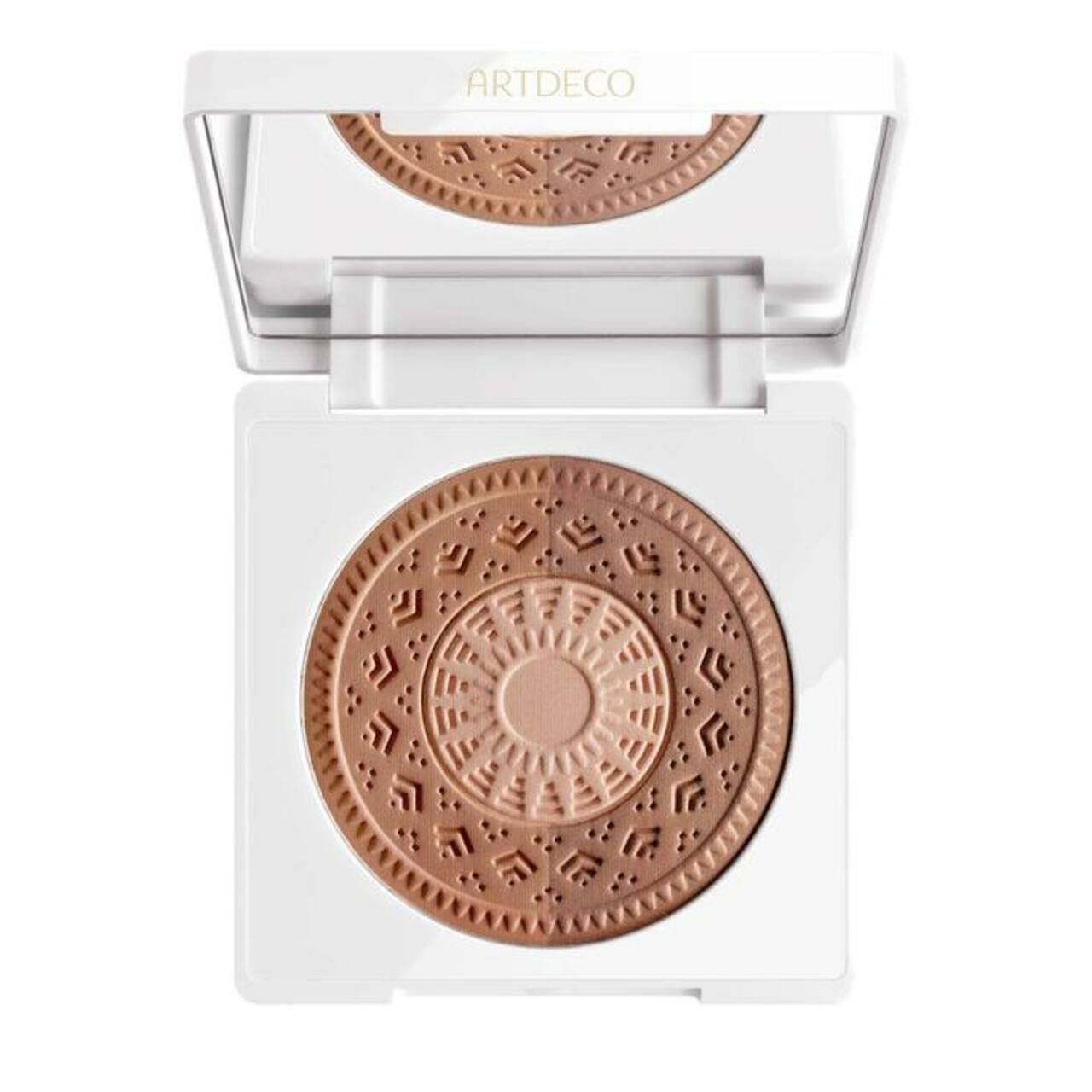 Kompakter Bronzer mit weißem Deckel. Geätztes Muster in verschiedenen Brauntönen. Marke "ARTDECO" auf dem Deckel.