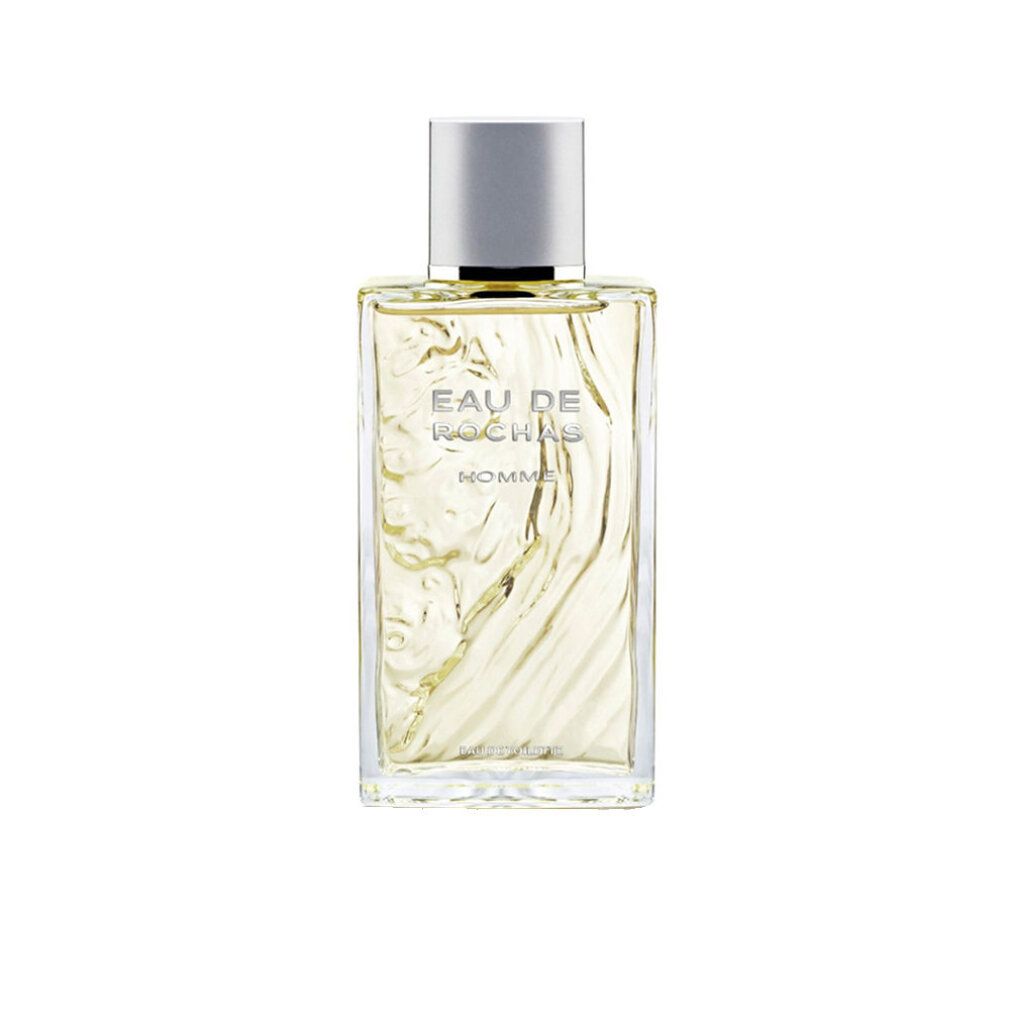 Quadratischer Flakon mit silbernem Deckel. Aufschrift: Eau de Rochas Homme Eau de Toilette. Geätztes Design.