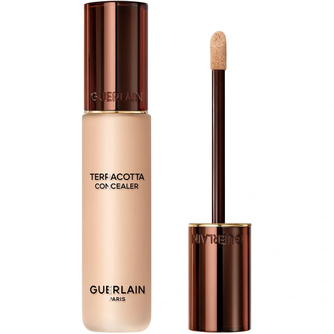Beige Concealer-Fläschchen mit braunem Deckel und Applikator. Text: Terracotta Concealer, Guerlain Paris.