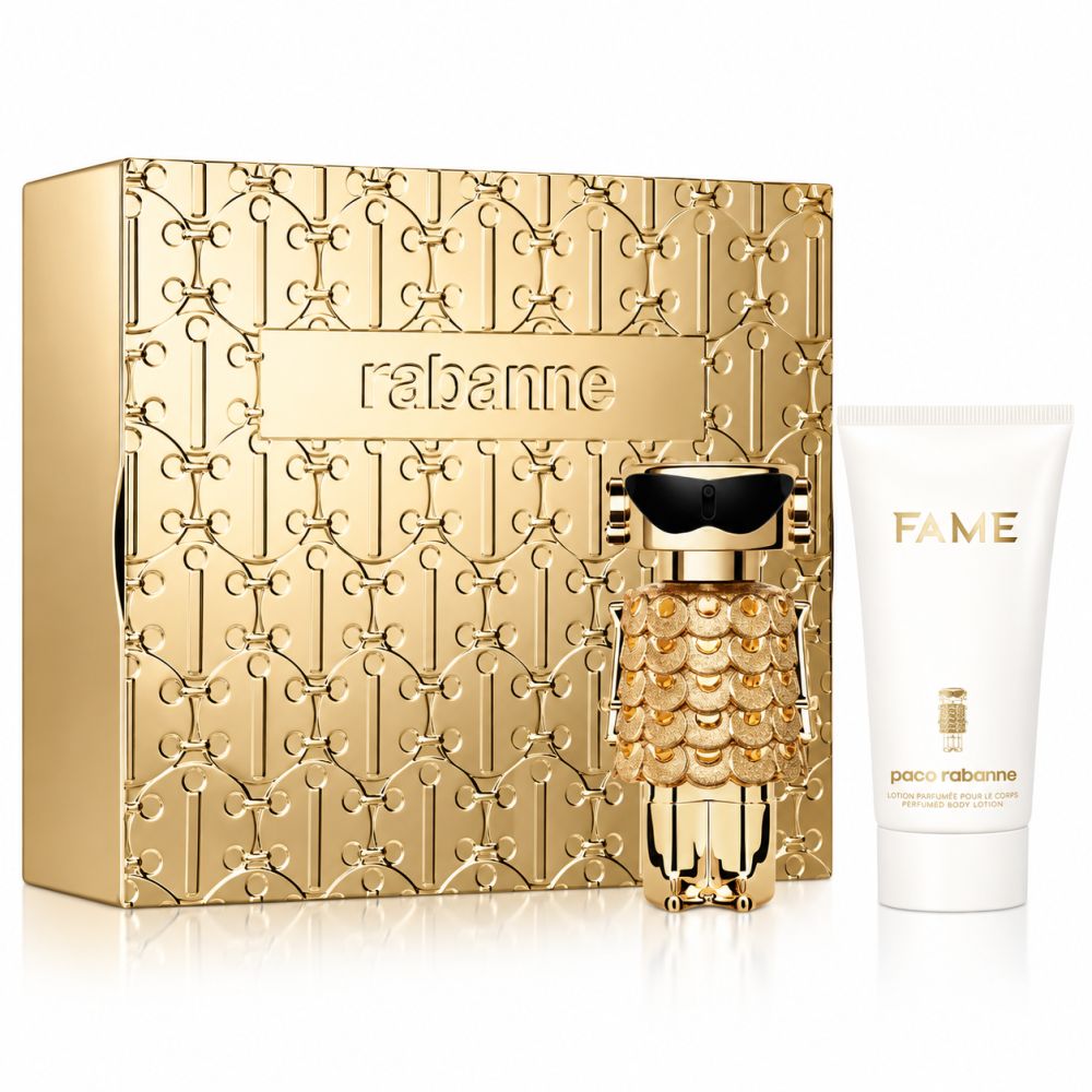 Goldenes Paco Rabanne Set mit Parfumflakon und Bodylotion. Der Flakon ist einer Roboterfigur nachempfunden.