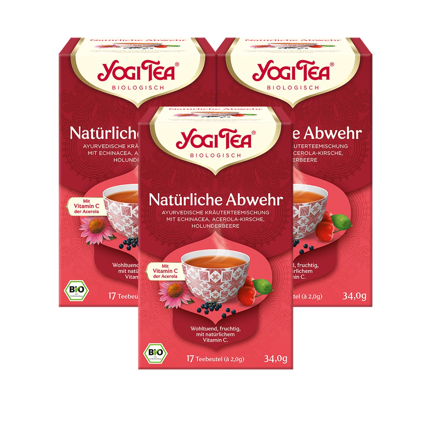 Mehrere Packungen Yogi Tea, Sorte Natürliche Abwehr. Rote Verpackung mit Logo, Produktname und Inhaltsangaben.