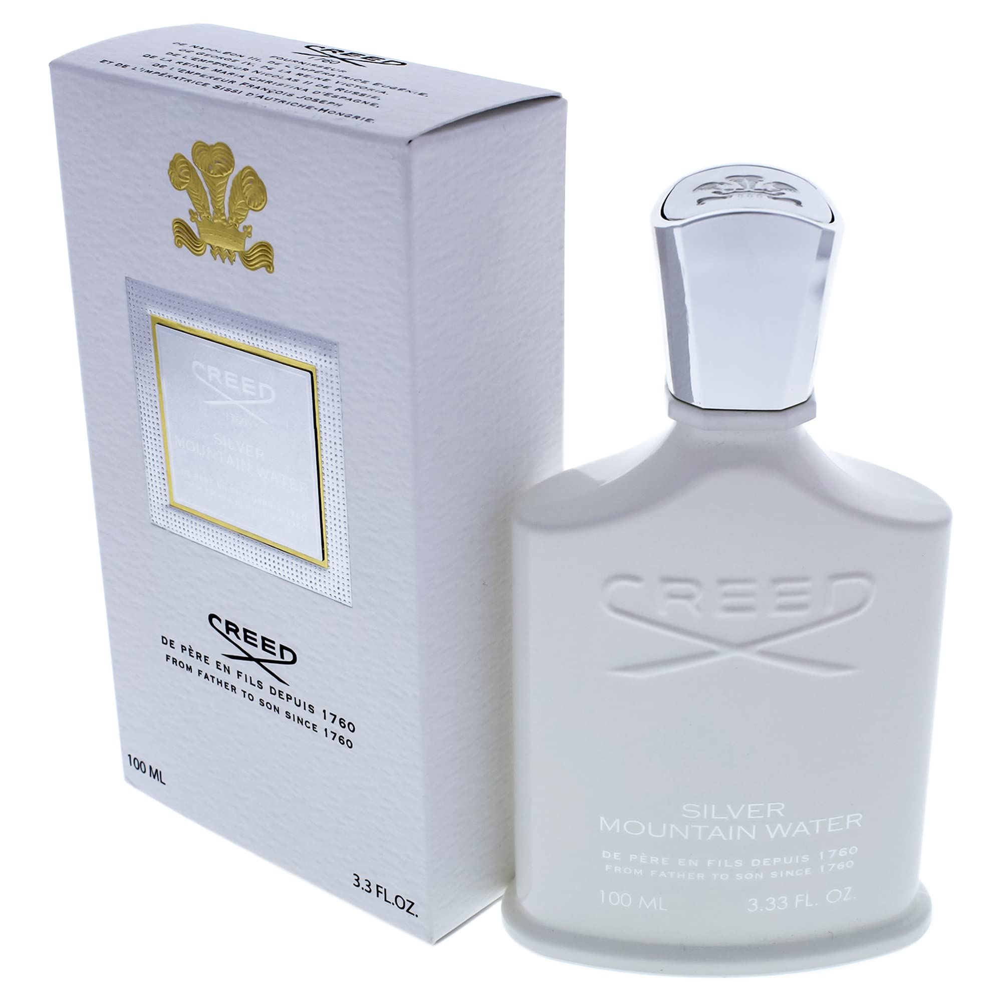 Weiße Parfumflasche und Verpackung. Aufschrift: Creed Silver Mountain Water. Flasche mit silbernem Verschluss.