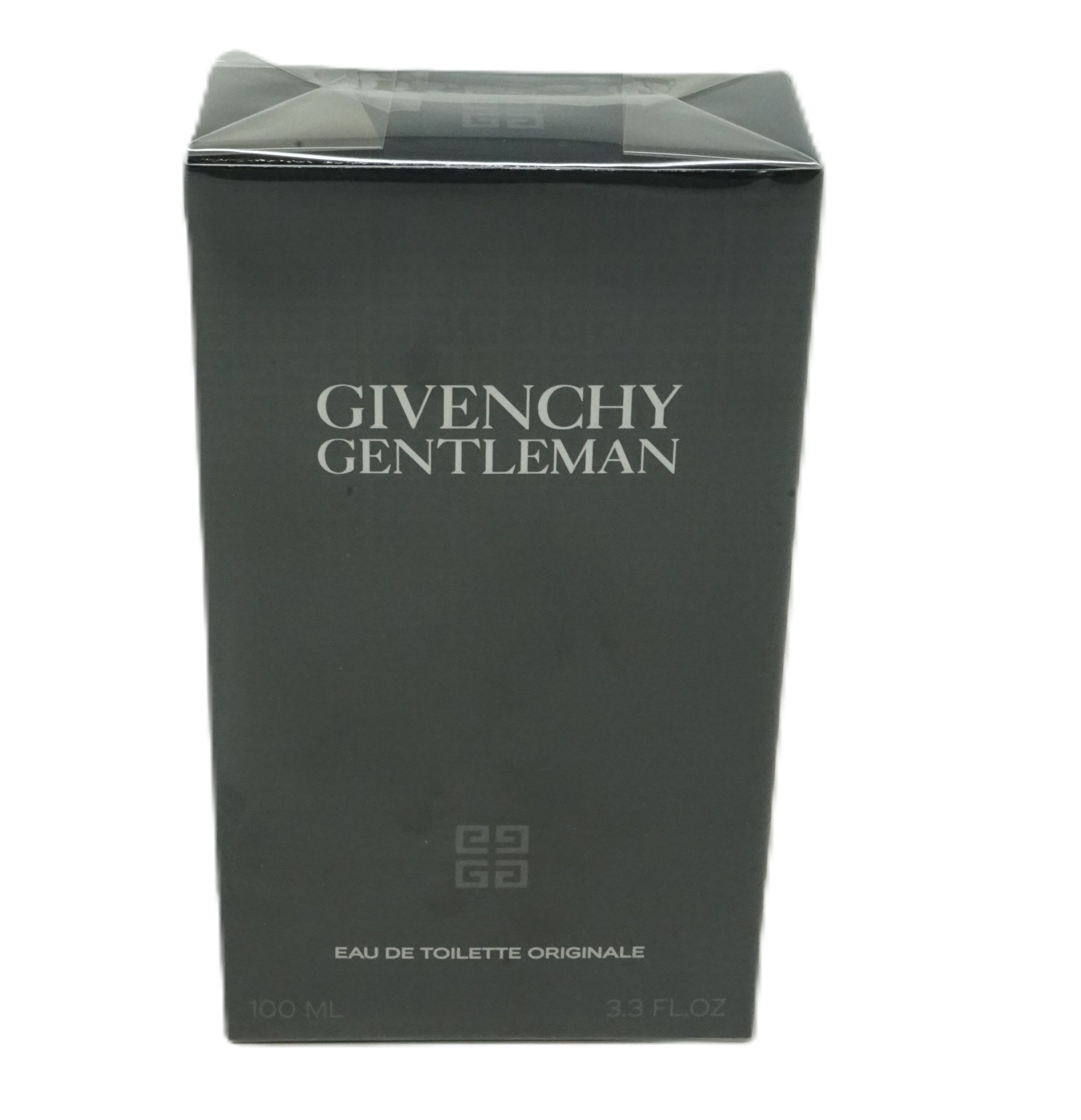 Schwarzer Karton mit weißem "GIVENCHY GENTLEMAN"-Schriftzug. Darunter "EAU DE TOILETTE ORIGINALE". Unten "100 ml" und "3.3 FL.OZ".