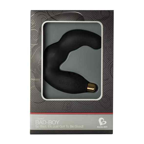 Schwarzes Wellness-Produkt in Verpackung. Goldfarbene Spitze. Text: BAD-BOY, Rocks-Off.