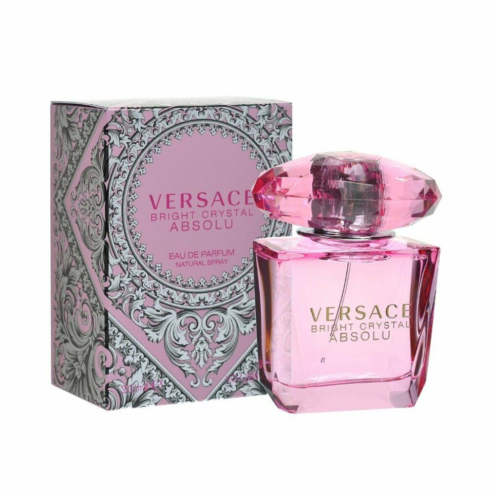 Rosa Flakon und Verpackung. Aufschrift: Versace Bright Crystal Absolu Eau de Parfum Spray. Verpackung mit Muster.