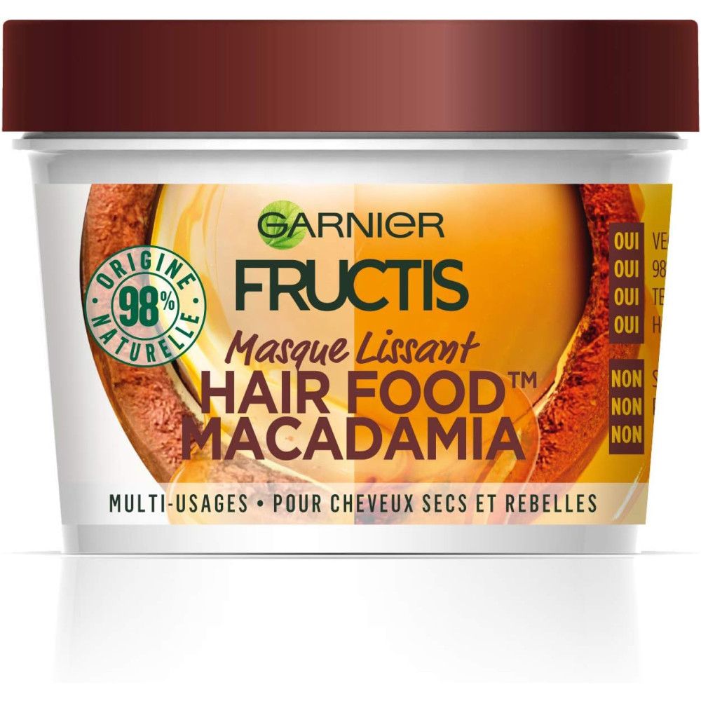 Garnier Fructis Masque Lissant Hair Food Macadamia Tiegel. Brauner Deckel, weißer Behälter mit Etikett. Text: Multi-usages.
