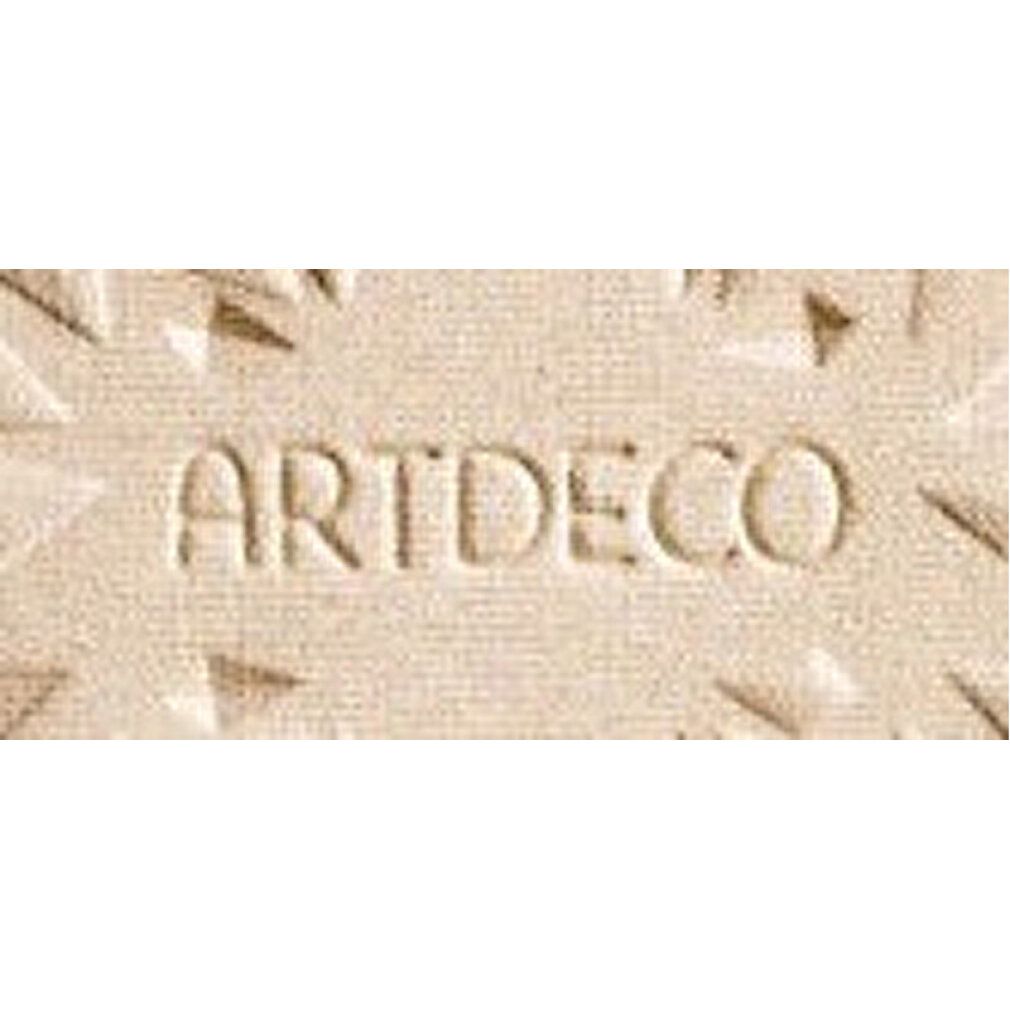 Nahaufnahme des Artdeco-Highlighter-Puders. Der Markenname ist in den Puder geprägt.