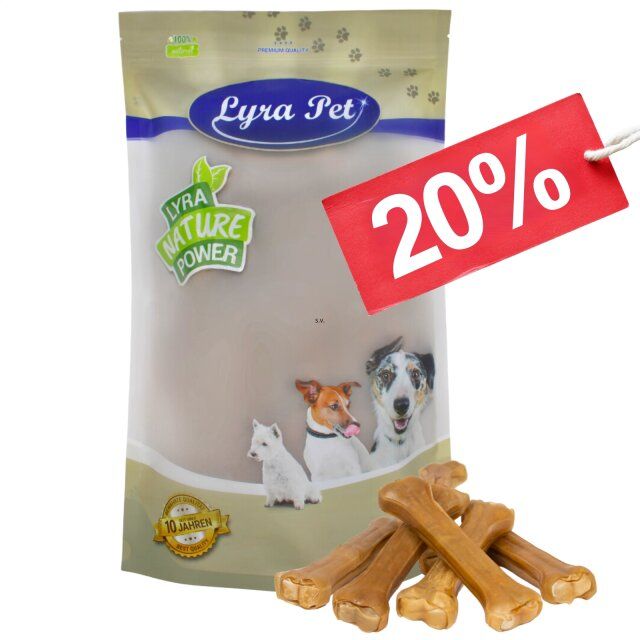 Lyra Pet Kauknochen, Verpackung mit Hunden, 20% Rabatt-Schild. Einige Kauknochen liegen vor der Verpackung.