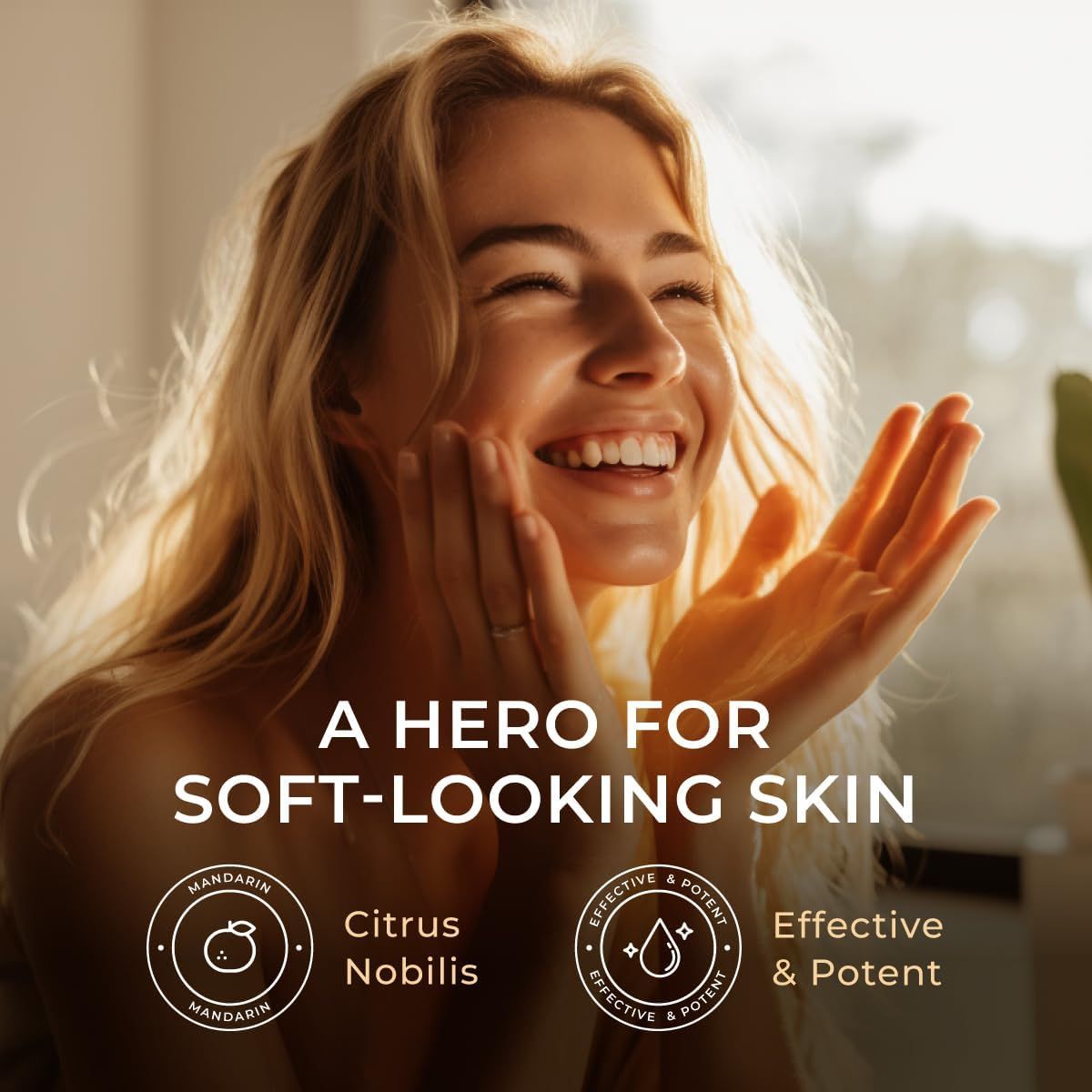 Frau mit blonden Haaren, die ihre Hände auf ihr Gesicht legt. Text: „A Hero for Soft-Looking Skin“. Kreisförmige Logos mit Text.