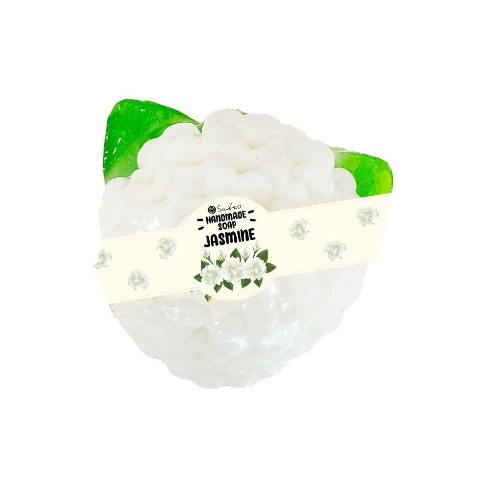 Weißes, blumenförmiges Seifenstück mit grünem Blatt. Mit Band, Aufschrift "Jasmine" und Logo.