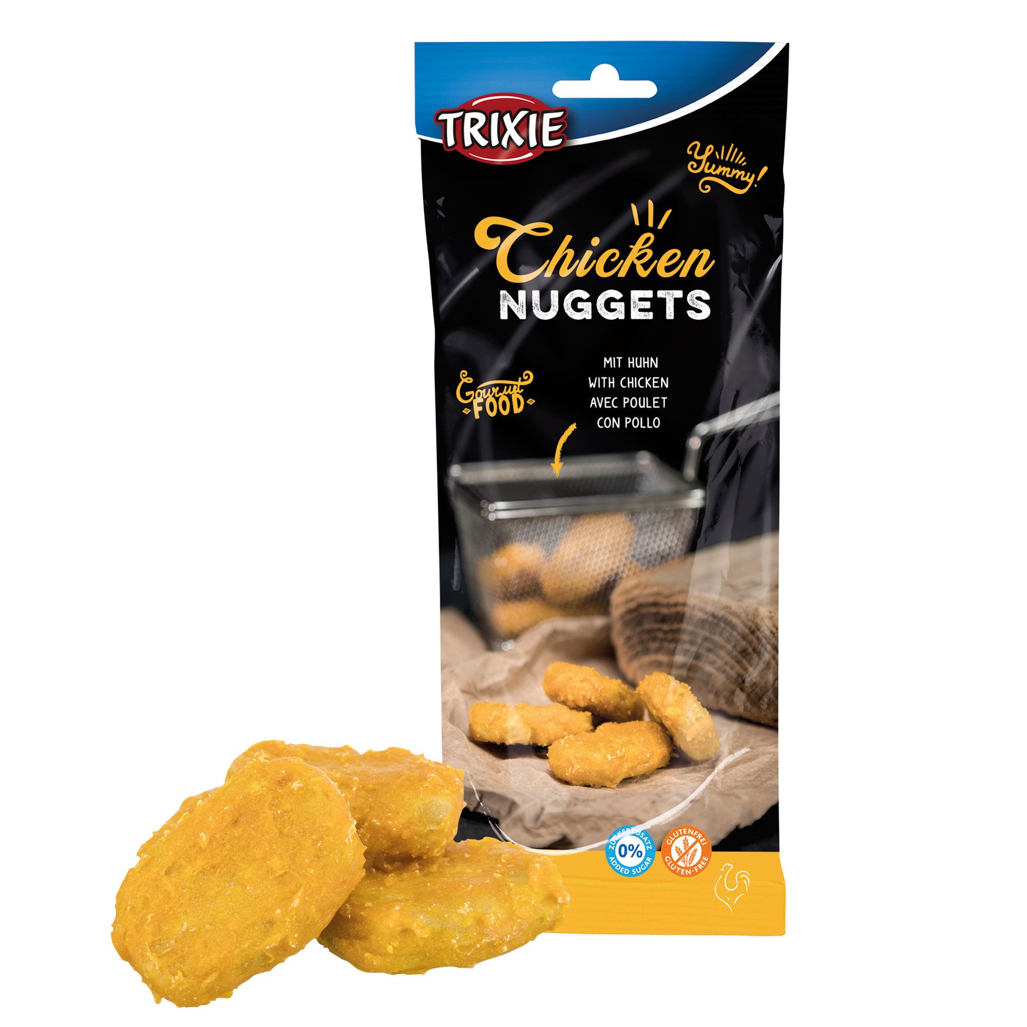 Trixie Chicken Nuggets Packung. Schwarze Verpackung mit Produktnamen. Einige Nuggets liegen vor der Packung.