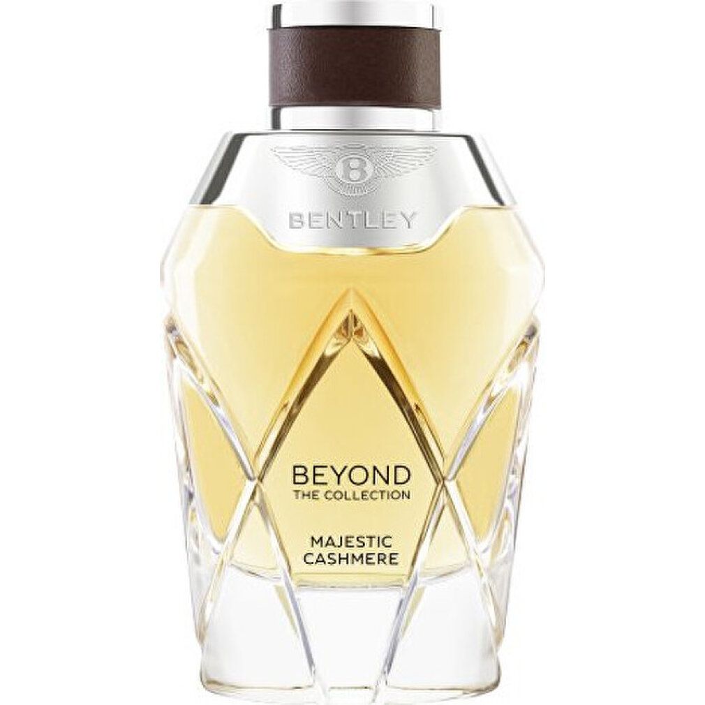 Bentley Majestic Cashmere Eau de Parfum Spray. Geformter Flakon mit silbernem Deckel. Klarer Glasflakon mit goldener Flüssigkeit.