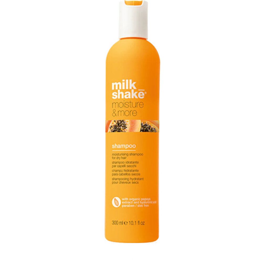 Orange Flasche milk_shake Moisture & More Shampooing Hydratant mit weißem Deckel. Enthält Papaya-Extrakt.