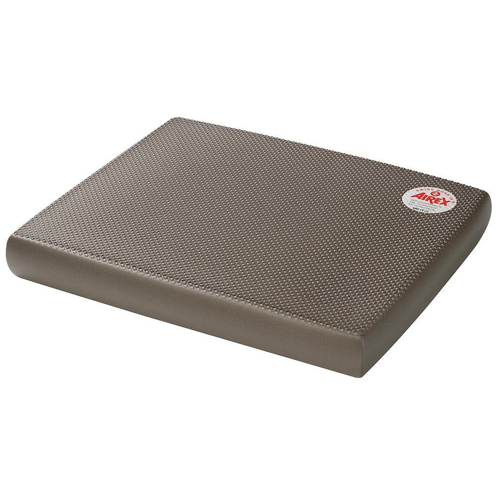 Braunes, rechteckiges Balance-Pad mit strukturierter Oberfläche. Airex-Logo-Aufkleber. Swiss Made.