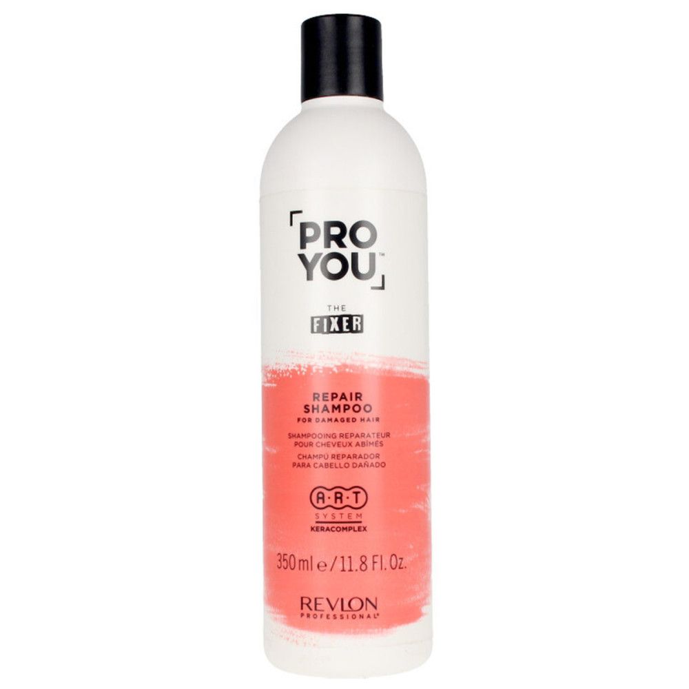 Weiße Flasche mit schwarzem Deckel. Aufschrift: PRO YOU THE FIXER REPAIR SHAMPOO. Rote Farbfläche. 350ml/11.8 Fl. Oz. Revlon Professional.