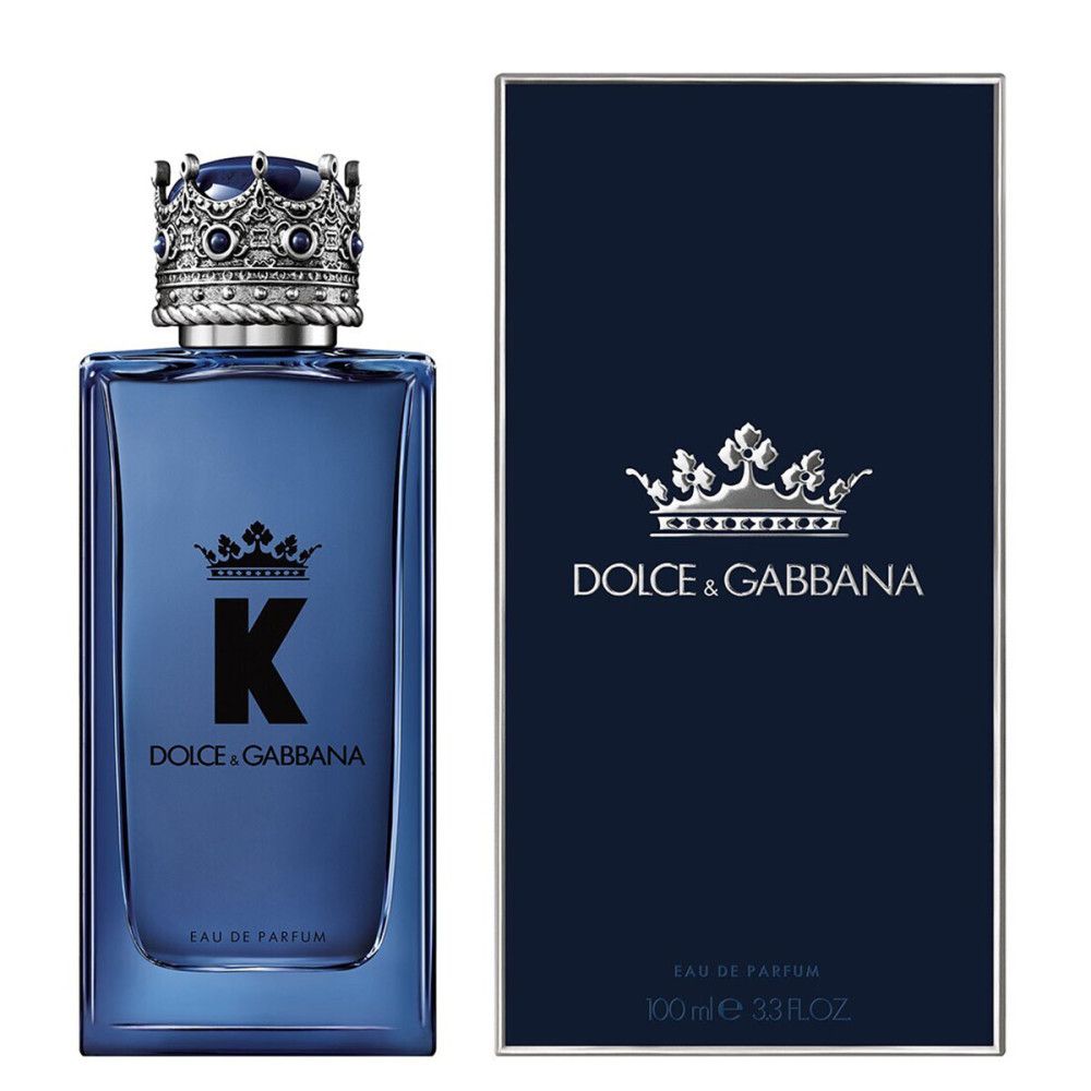 Kartonverpackung und blaue Glasflasche mit silberner Krone. Logo 'K' und Schriftzug Dolce & Gabbana.