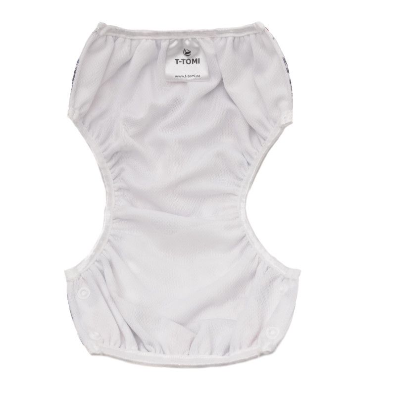 Innenansicht der Schwimmwindel. Weißes Material mit T-TOMI-Etikett. Druckknöpfe an den Seiten. Offene Form.