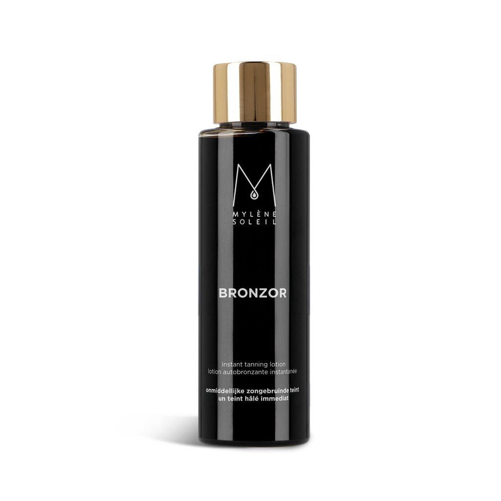 Schwarze Flasche mit goldener Kappe. Aufschrift: Mylène Soleil, Bronzor, Instant Tanning Lotion.