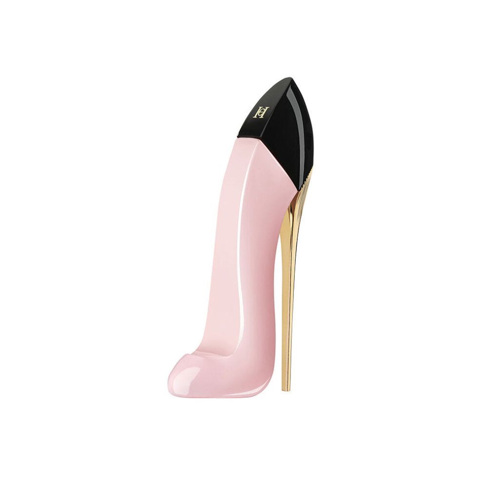Ein rosa Pumps-Parfümflakon mit goldenem Absatz und schwarzer Kappe.