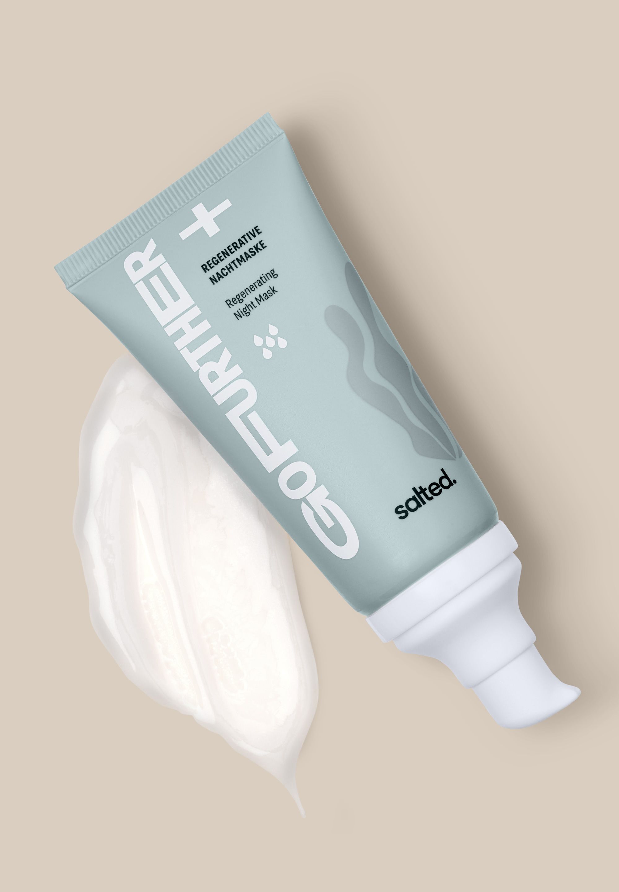 Tube mit gesalzenem Regenerative Nachtmaske, daneben eine Probe der Maske.