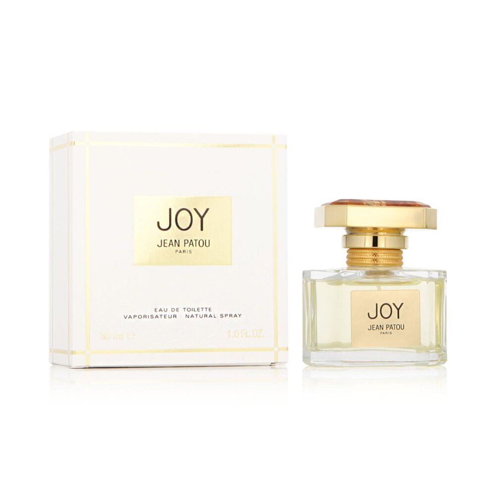 Parfümflakon und Verpackung. Flakon mit goldfarbenem Verschluss und Etikett "JOY JEAN PATOU PARIS". Verpackung mit Logo.