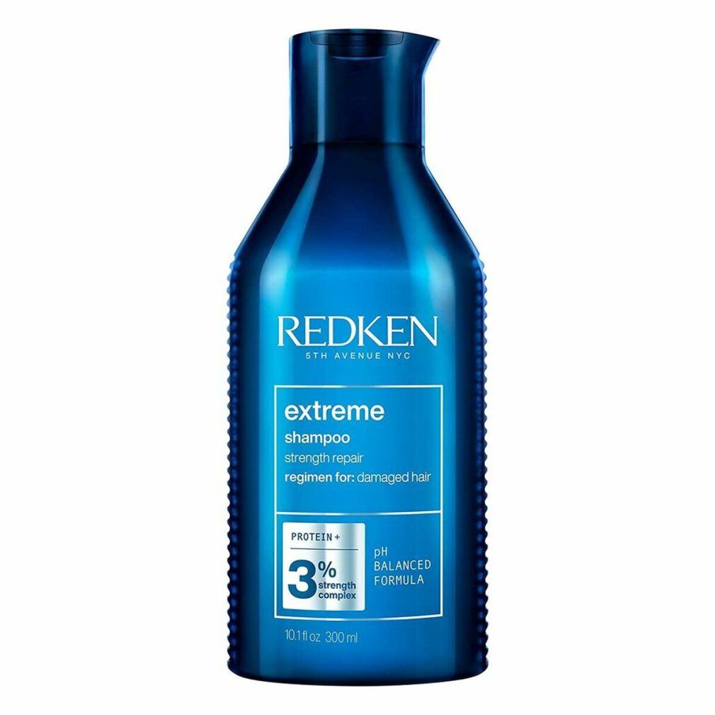 Dunkelblaue Shampoo-Flasche mit "Redken extreme" Aufschrift. Enthält 3% Strength Complex. 300ml.