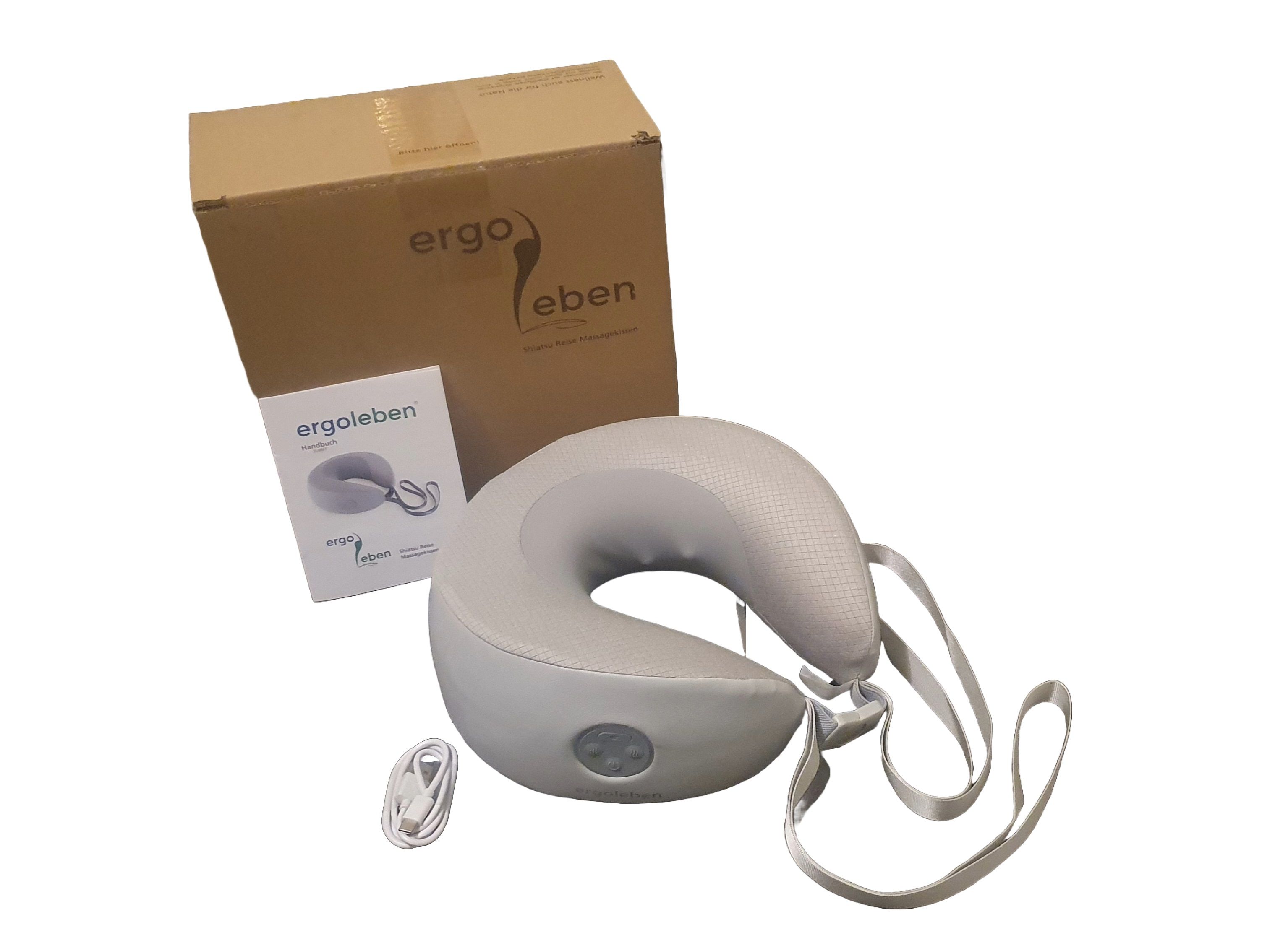 Graues Nackenmassagekissen, Verpackung, Bedienungsanleitung und Ladekabel. Logo 'ergoleben' auf der Verpackung.