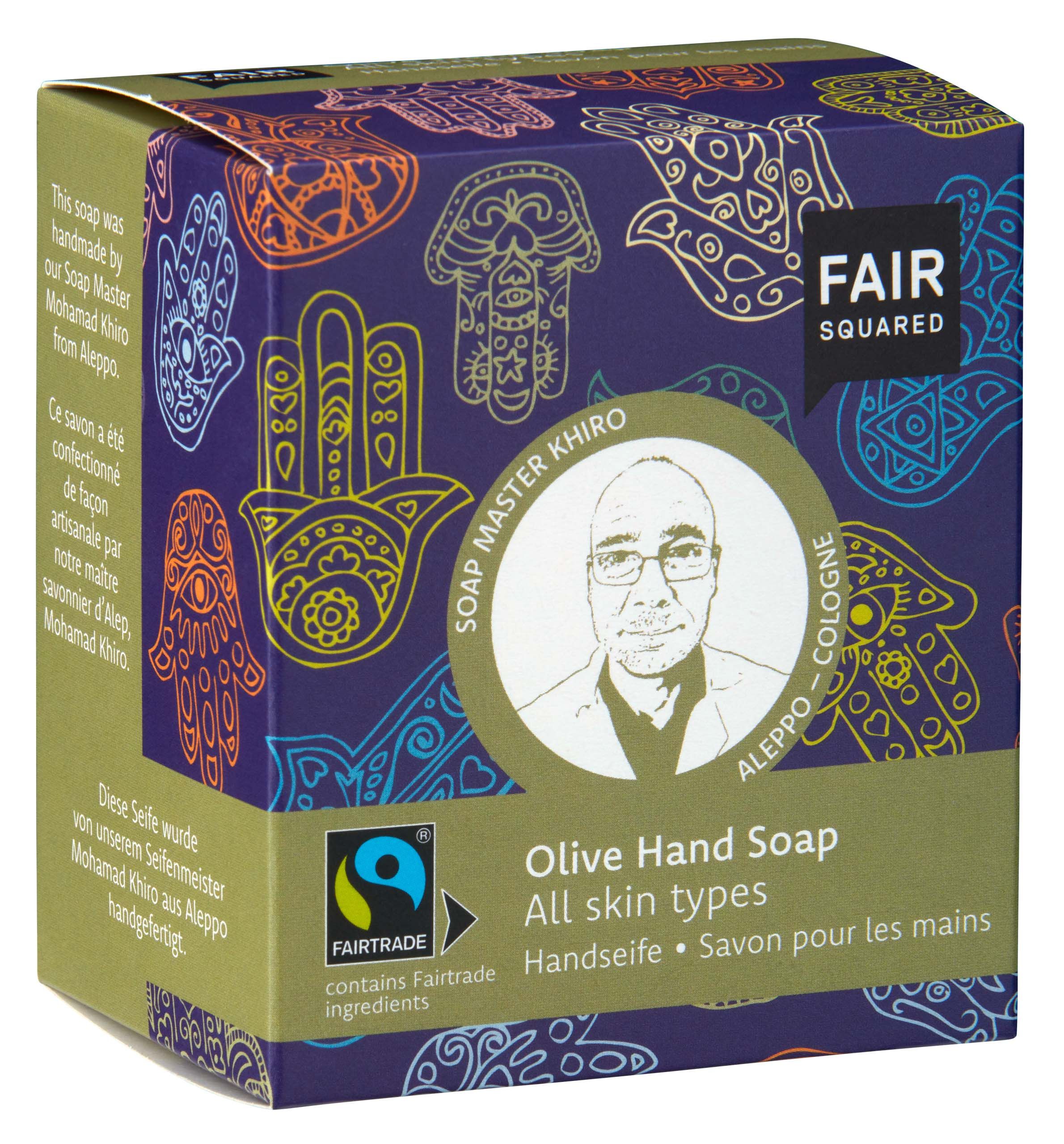 Verpackung von Fair Squared Handseife Olive. Aufdrucke: Fairtrade, Hamsa-Muster, Porträt, Schriftzug.