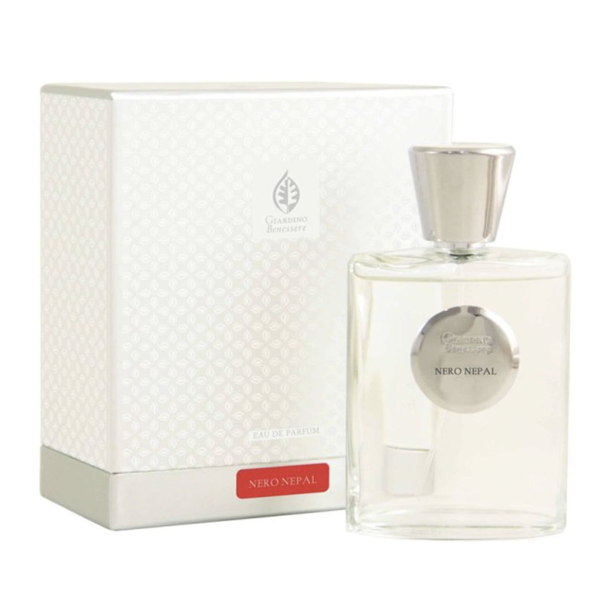 Glasflakon mit silbernem Verschluss und Verpackung. "NERO NEPAL"-Etikett.