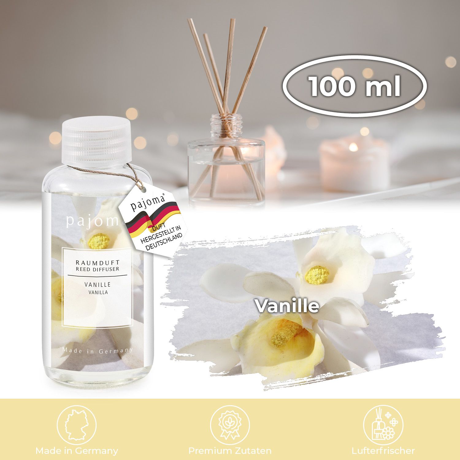 Klarer Flakon mit weißem Deckel und Etikett. Aufschrift: Vanille. Mit Holzstäbchen und Blüten.