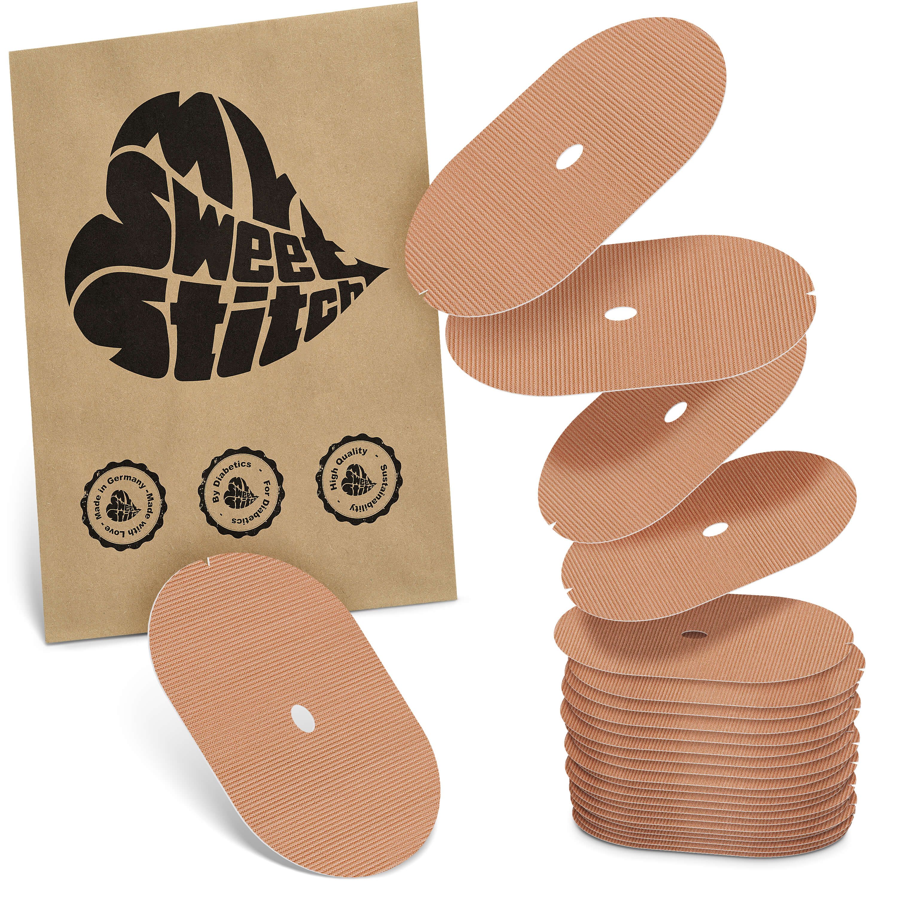 Braune Verpackung mit ovalen Pflastern. Produkt: MySweetStitch. Mehrere ovale Pflaster mit Loch, geriffelte Oberfläche.