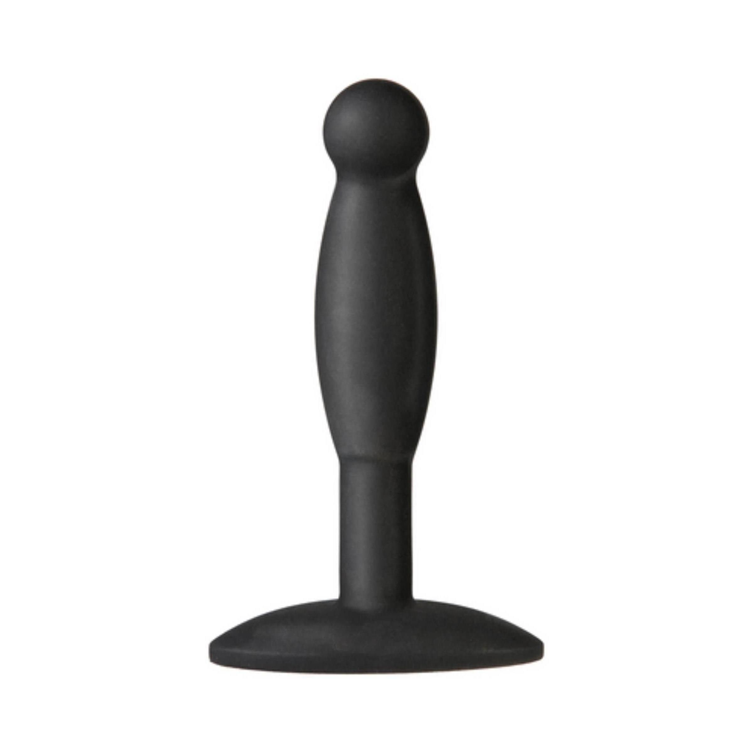 Schwarzer Butt Plug aus Silikon. Mit rundem Kopf, konischem Schaft und breiter Basis.
