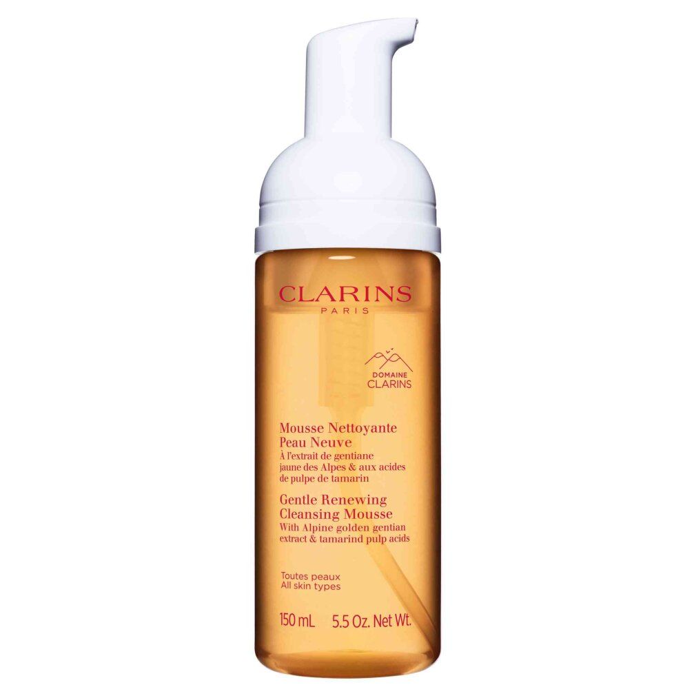 Clarins Reinigungsmousse in einem transparenten Spender mit weißem Pumpkopf. Gelbe Flüssigkeit sichtbar.