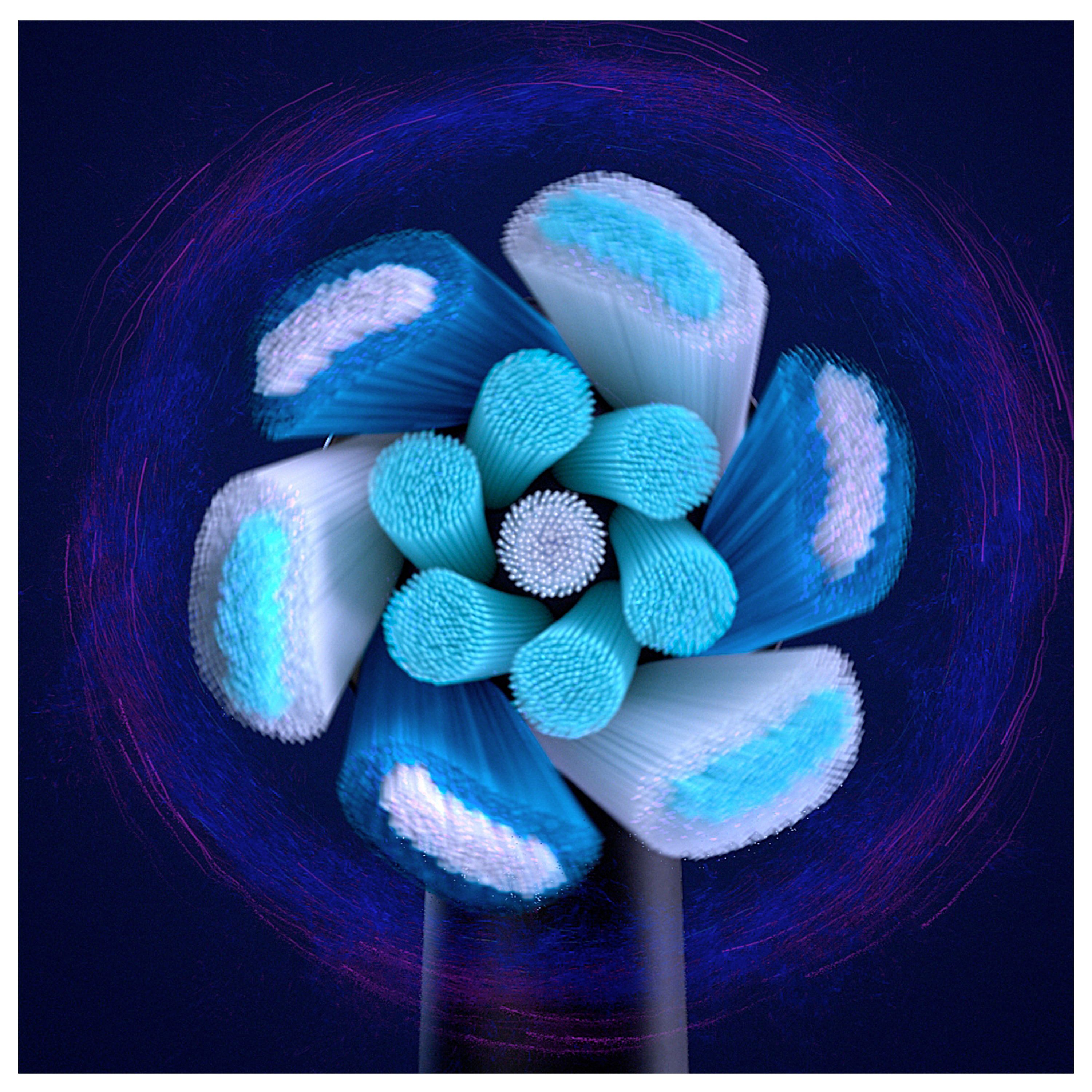 Nahaufnahme der Borsten einer Zahnbürste. Blaue und weiße Borsten. Blaue Lichteffekte.