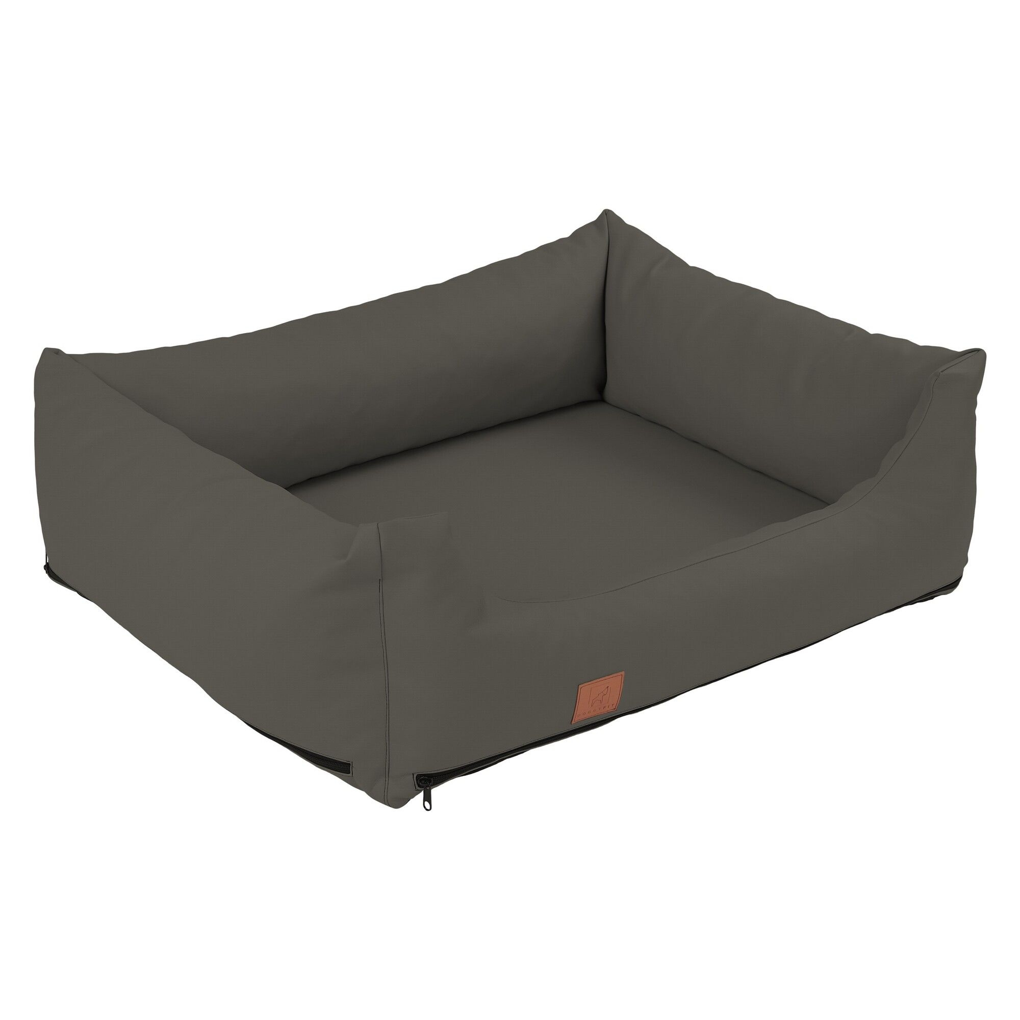 Rechteckiges Hundebett, taupefarbenes Kunstleder, mit Reißverschluss. Braunes Label an der Seite.