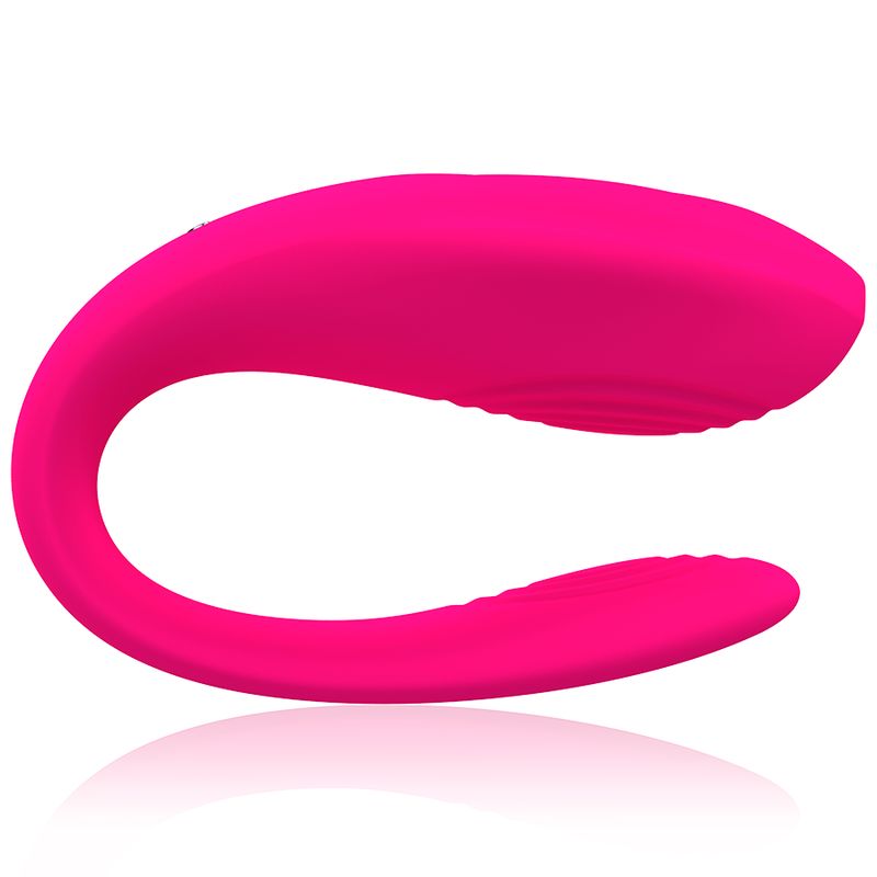Pinkfarbener Paar-Vibrator in U-Form. Die Oberfläche ist glatt und reflektierend.