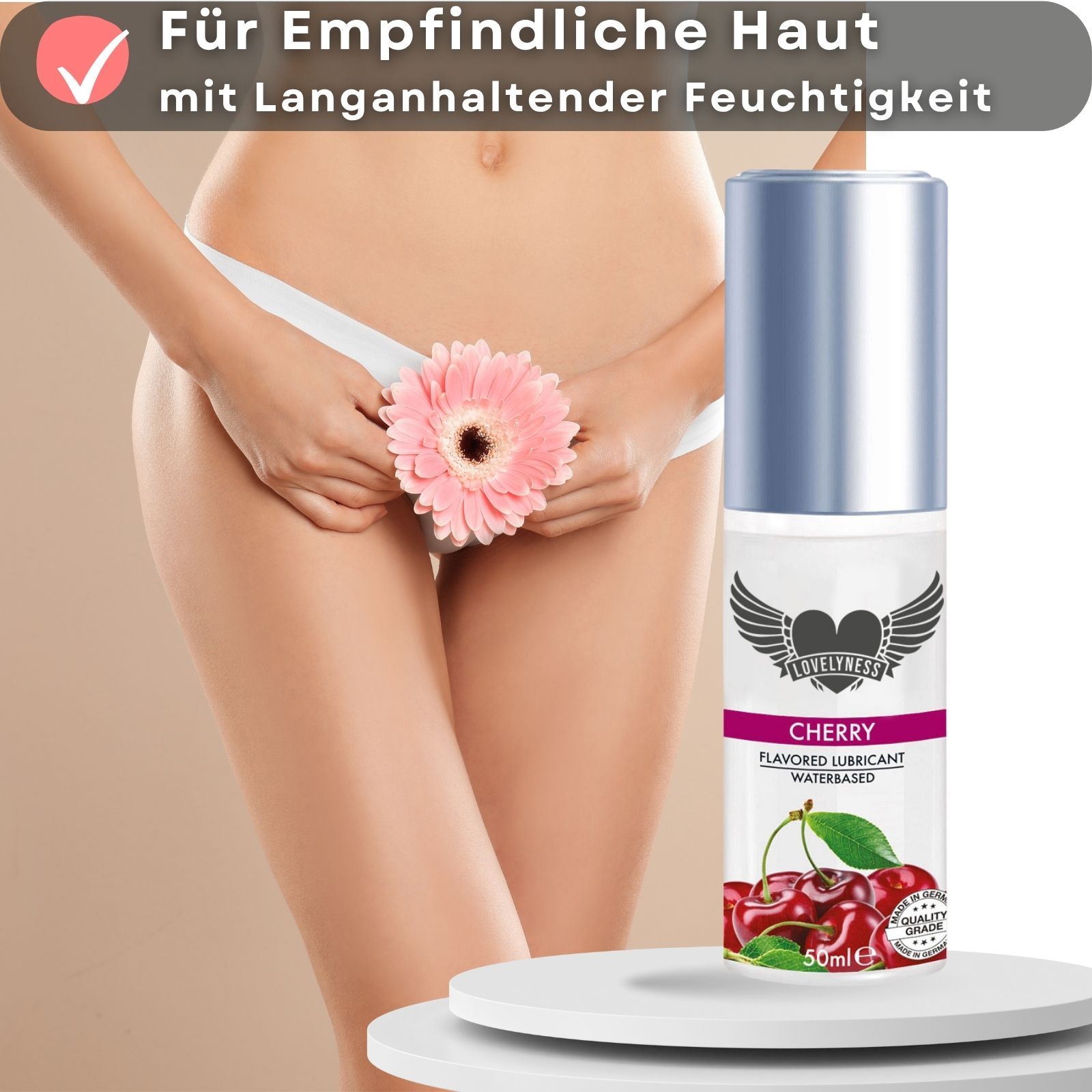 Frau mit Blüte. Flasche mit Gleitgel Kirsche. Text: Für empfindliche Haut, mit langanhaltender Feuchtigkeit.