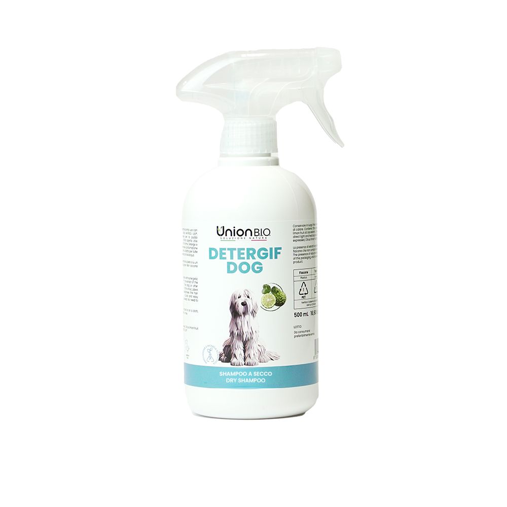 Weiße Sprühflasche mit Produktetikett. Aufschrift: DETERGIF DOG. Abbildung eines Hundes und Limetten. Trockenshampoo.