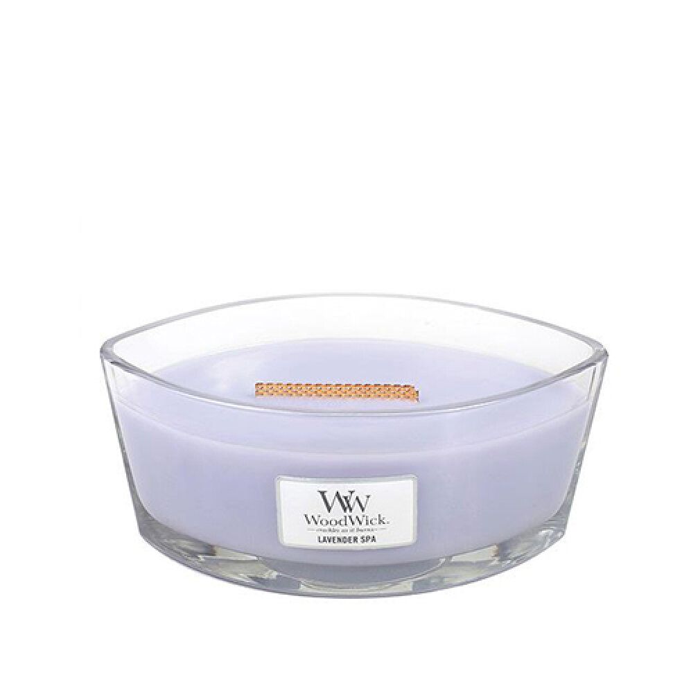 Glasbehälter mit lila Wachs und Holzdocht. Aufschrift: WoodWick, Lavender Spa. Ellipsenförmig.