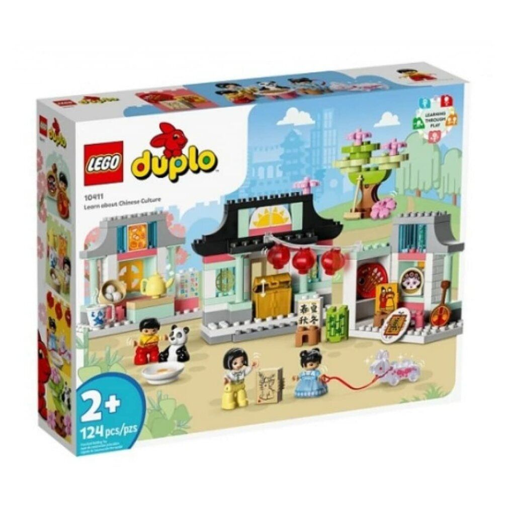 LEGO Duplo Set. Enthält Gebäude, Figuren und Zubehör. Verpackung mit Produktname und Altersempfehlung.