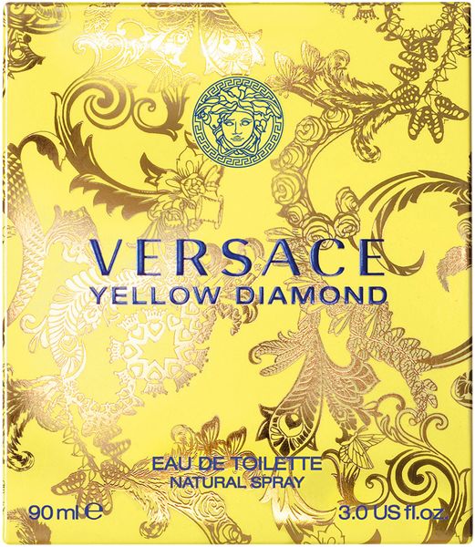 Gelbe Verpackung von Versace Yellow Diamond. Logo, Schriftzug und dekoratives Muster. Text: Eau de Toilette.