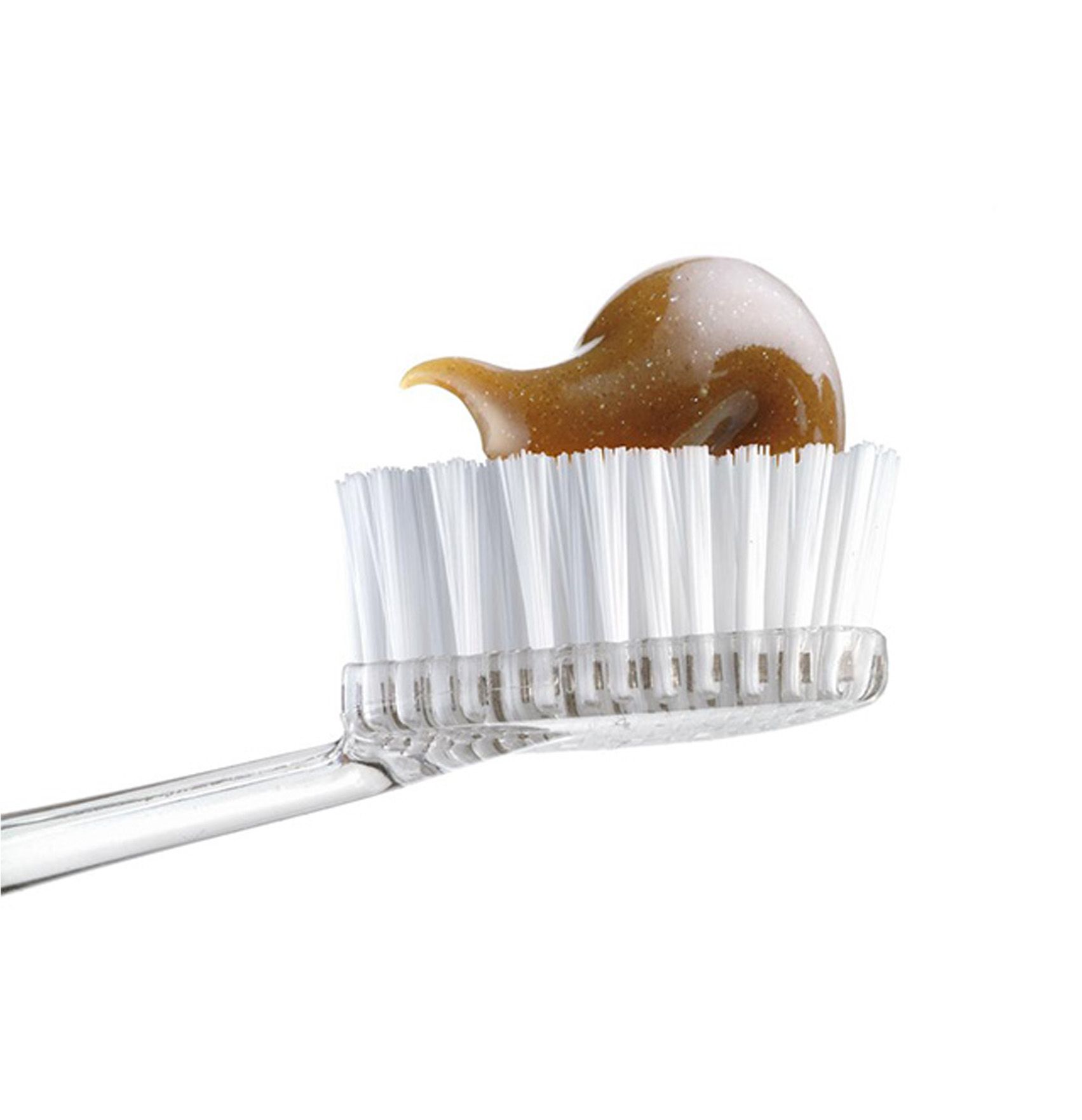 Zahnbürste mit braunem Gel. Borsten weiß, Griff transparent.
