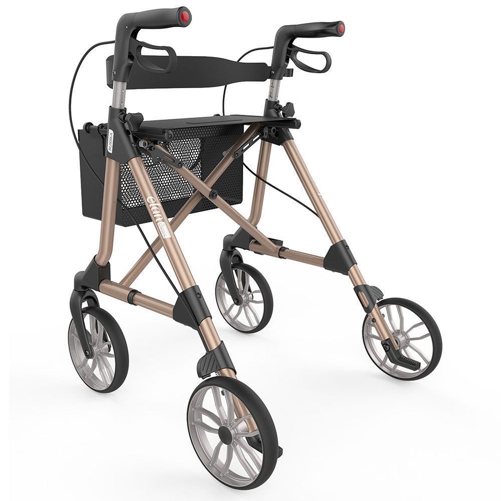 Rollator mit vier Rädern, champagnerfarbenem Rahmen, schwarzem Sitz und Korb. Räder mit silbernen Akzenten.