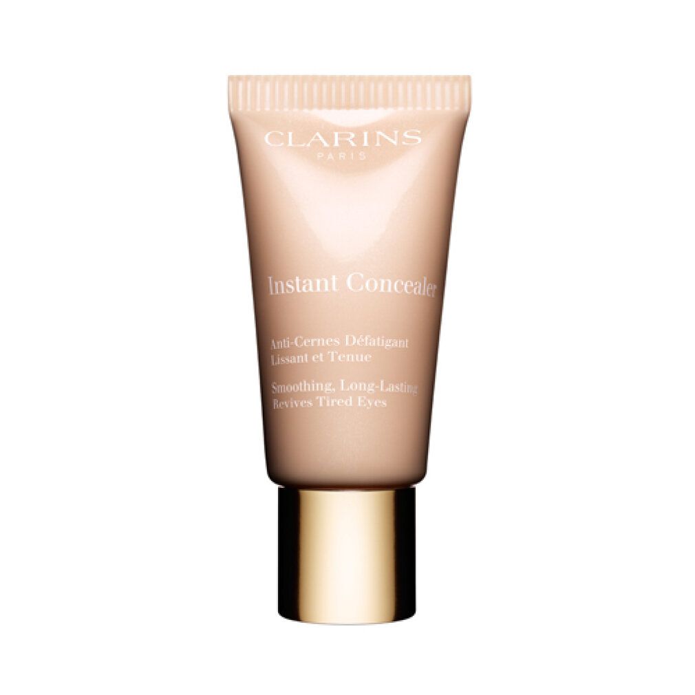 Clarins Instant Concealer Tube. Beige-gelbe Farbnuance. Text auf dem Tube: Instant Concealer, Anti-Cernes Défatigant, Lissant et Tenu.
