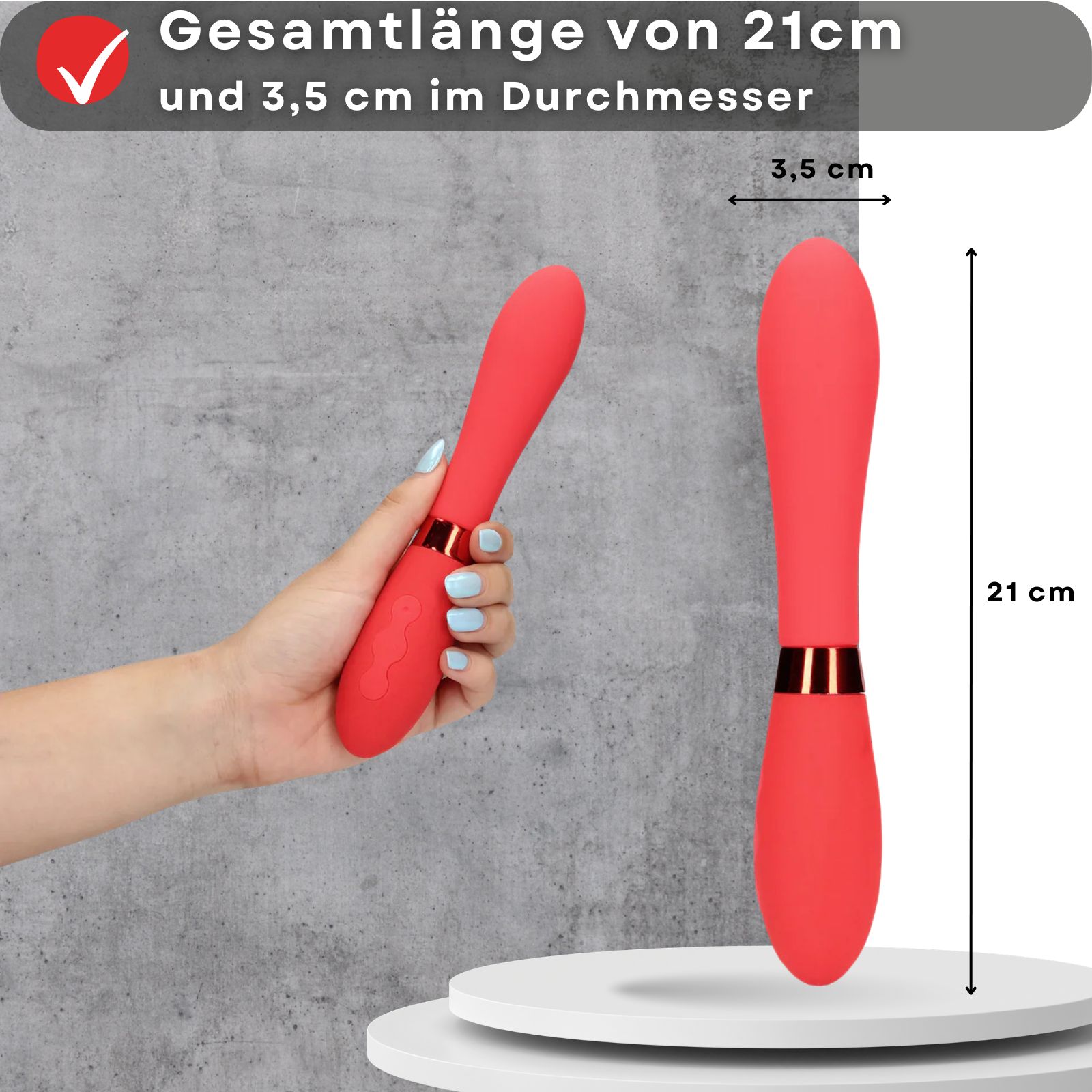 Roter Vibrator. 21 cm lang, 3,5 cm Durchmesser. Hand hält Vibrator. Maße angezeigt.
