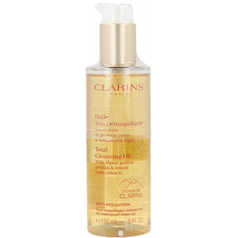 Klare Flasche mit goldfarbenem Inhalt und Dosierpumpe. Beschriftung: Clarins Total Cleansing Oil, 150 ml.