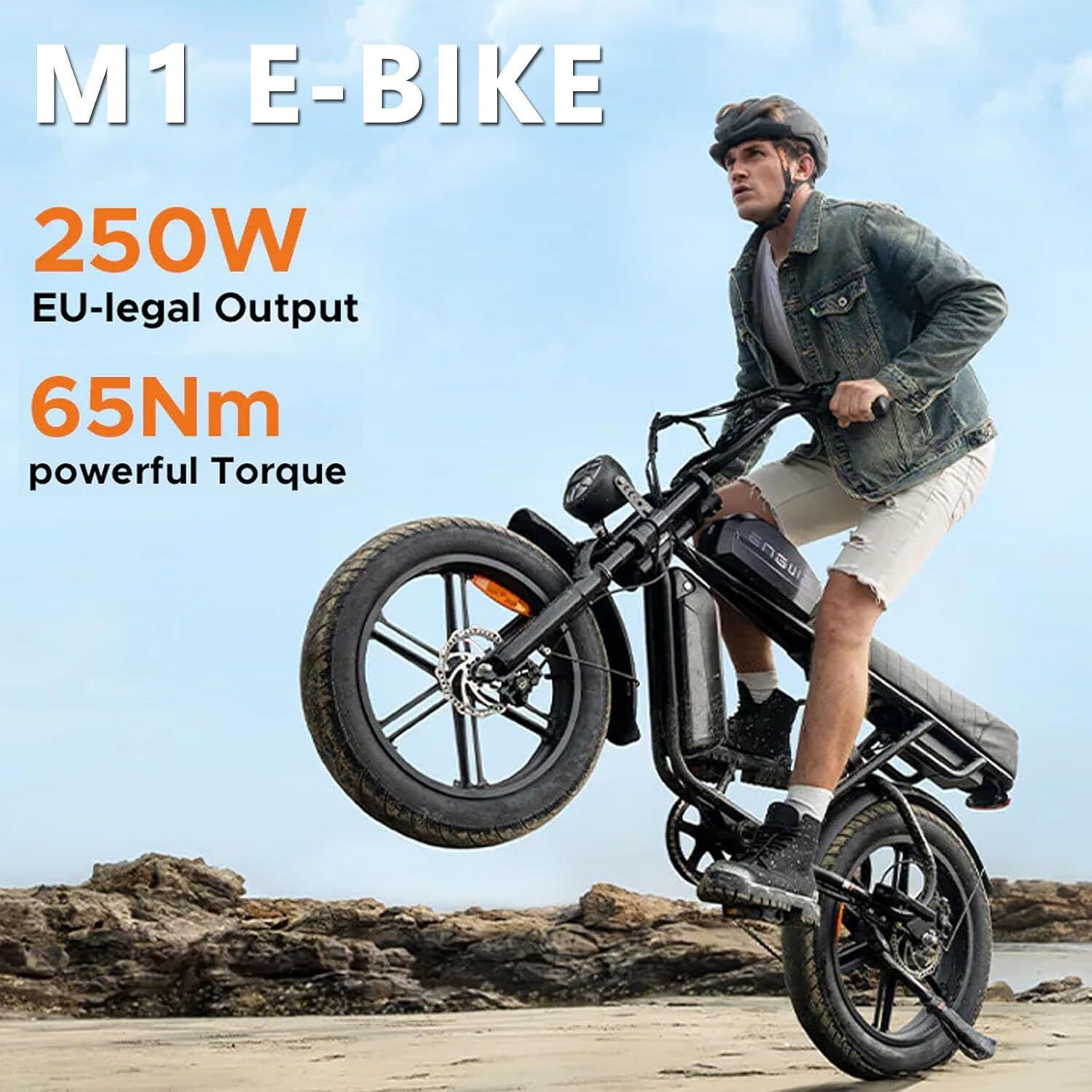 Schwarzes E-Bike auf Sand. Text: "M1 E-BIKE 250W EU-legal Output 65Nm powerful Torque". Eine Person fährt das Rad.