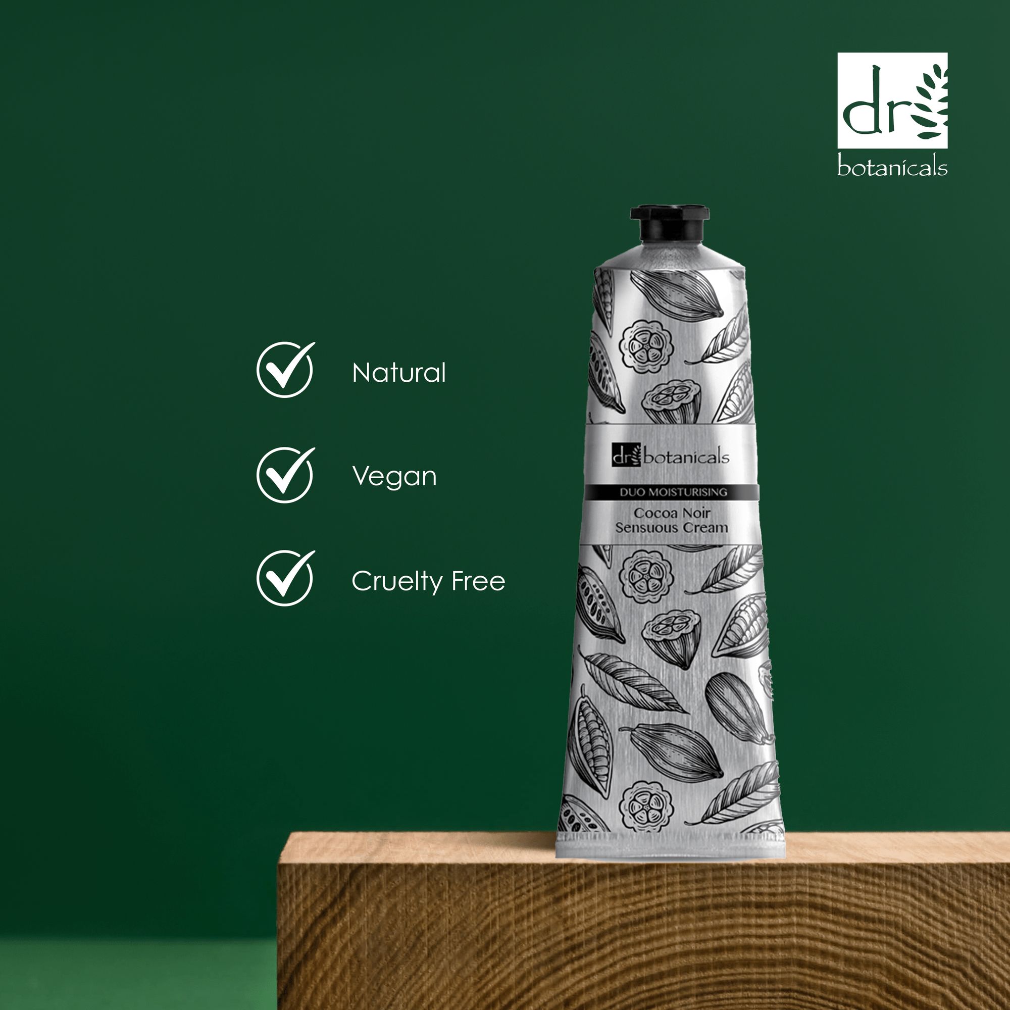 Tube mit botanischem Muster. Text: Cocoa Noir Sensuous Cream, Duo Moisturising. Marke: Dr Botanicals. Symbole: Natürlich, Vegan, Cruelty Free.