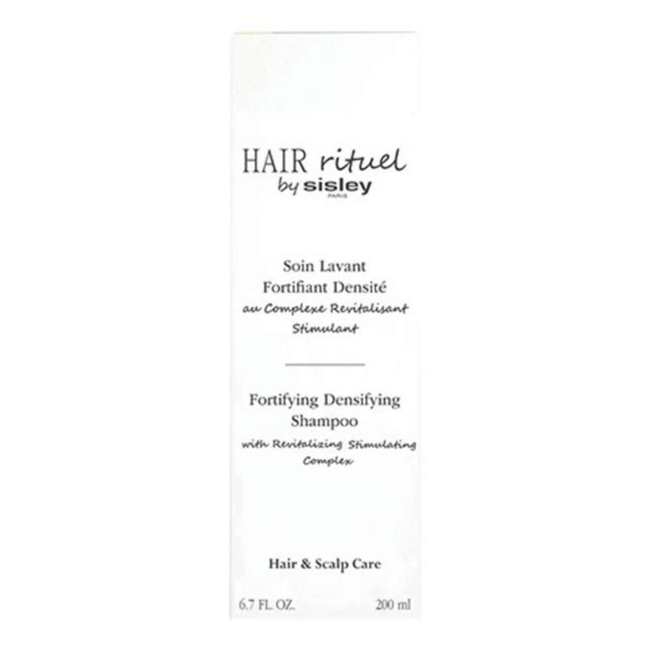 Weißes Etikett mit Text: Hair Rituel by Sisley, Fortifying Densifying Shampoo. Schwarzer Hintergrund.